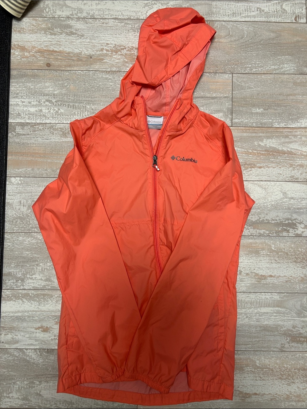 Columbia Kids Orange Hooded Packable Rain Jacket Size L. Like new.